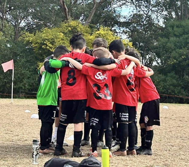 Youth Soccer Team Huddles - SCOTS LIONS FC